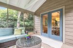Spacious screen porch is just off the dining room